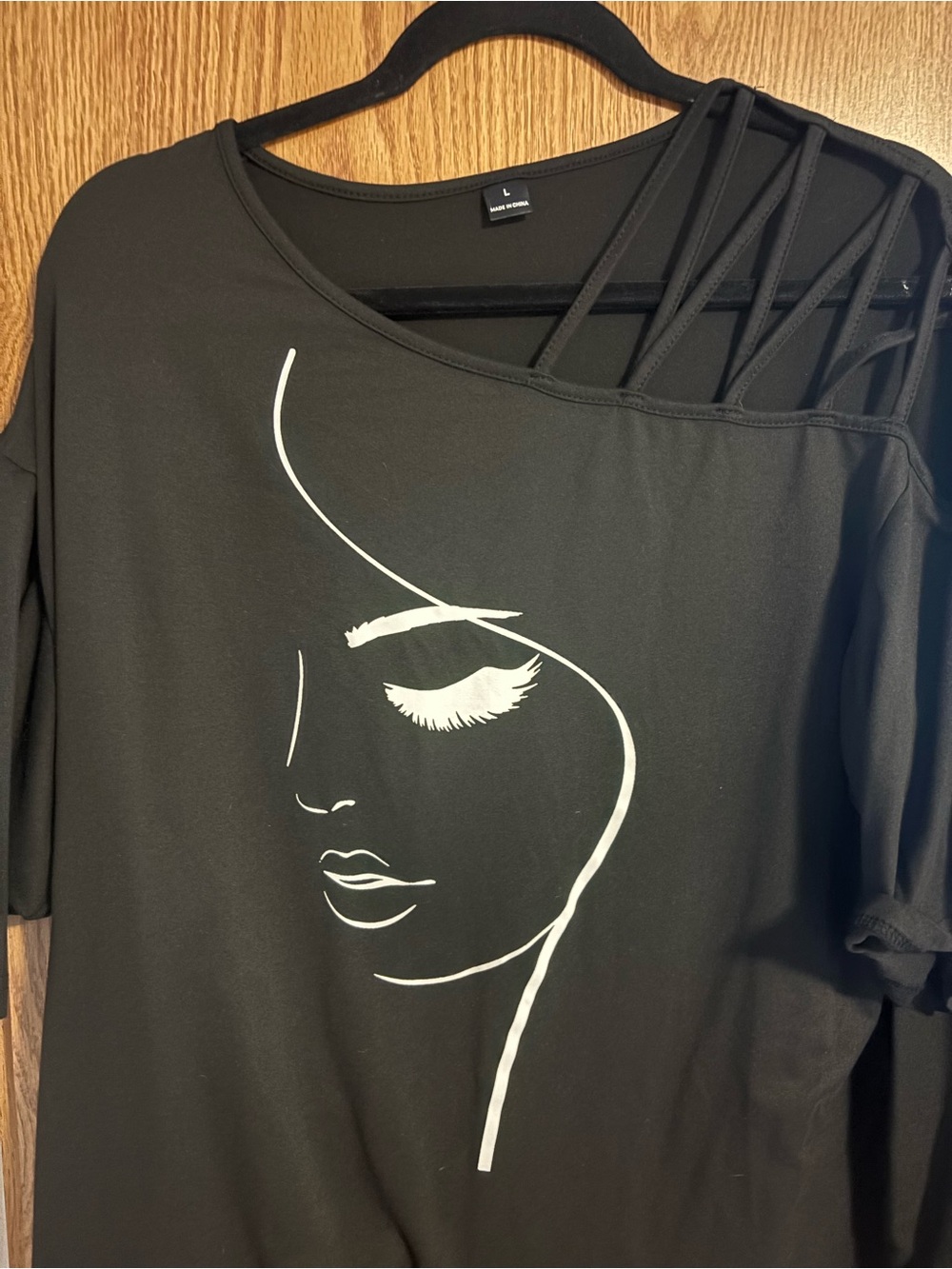 Black Women’s Graphic Tee with Strappy Shoulder